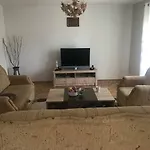 Amar Apartmani, *